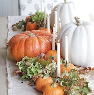 DIY Table Fall Centerpiece with pumpkins, taper candles and greenery