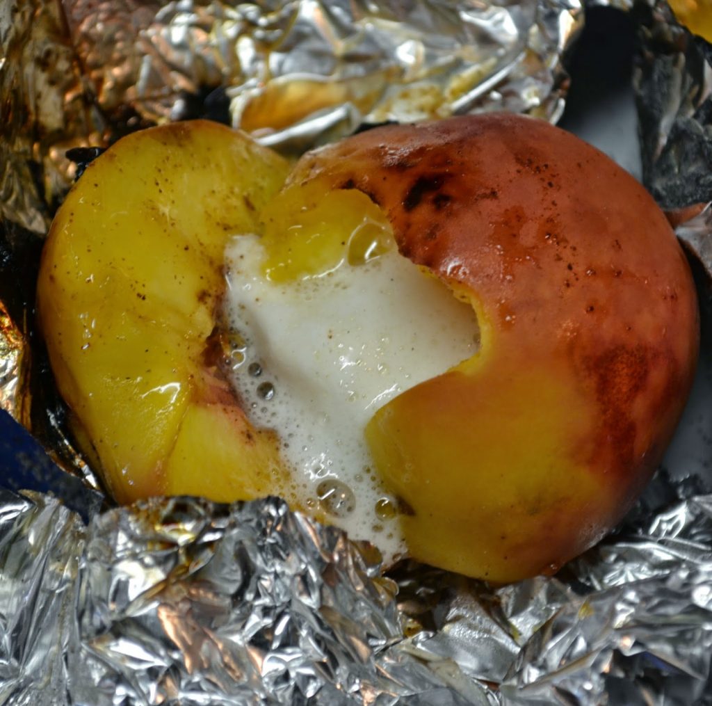 Roasting Peaches on campfire