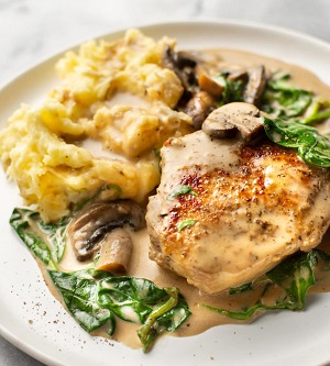 creamy spinach mushroom pork chops 4 1024x1536 1